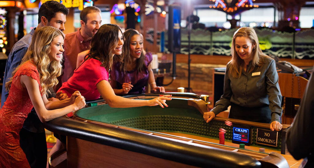 Gaming TahoFriends playing craps in South Lake Tahoe Casinoe South Craps