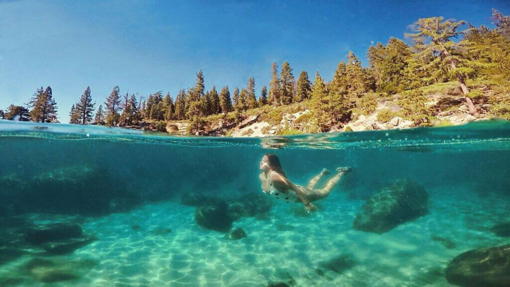 Swimmer in the clear waters of Lake Tahoe