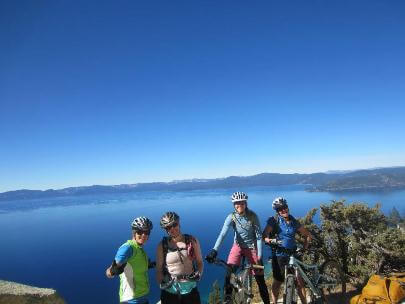 Women biking Flume Trail 