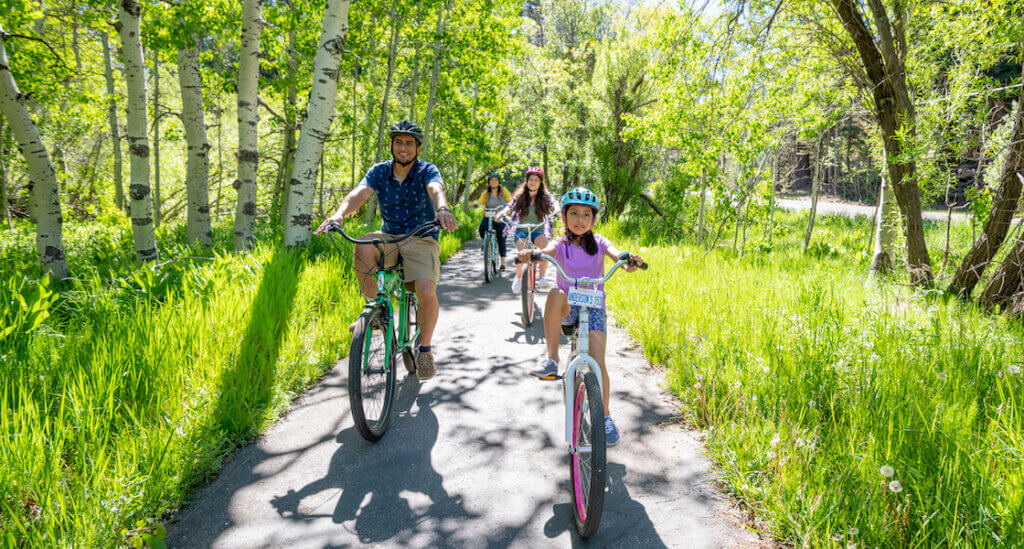 Family on bike trail at Taylor Creek