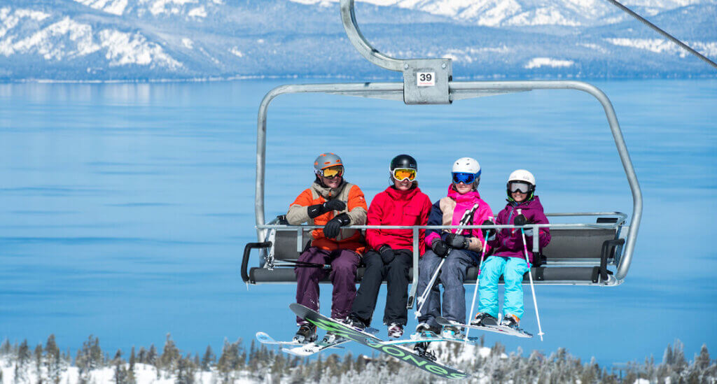 Family riding a chairlift at Heavenly Mountain Resort