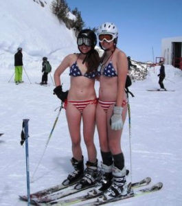 two girls in bikins spring skiing