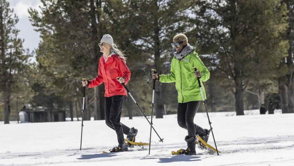 Two women snowshoeing at Lake Tahoe