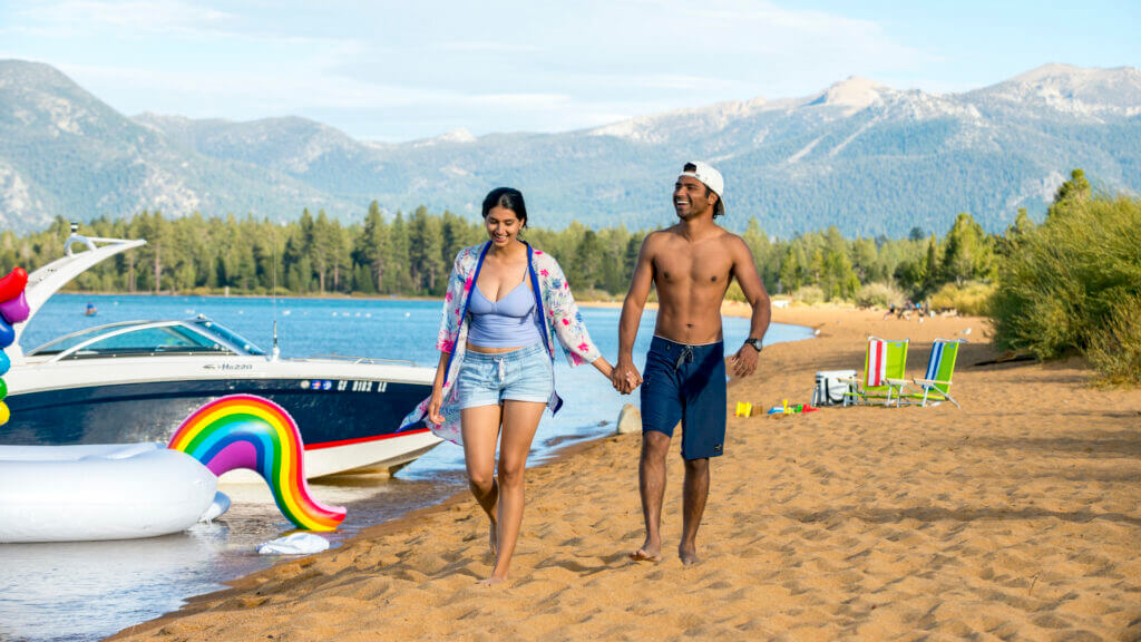 A couple enjoying the beach at Lake Tahoe - Rachid Dahnoun / LTVA