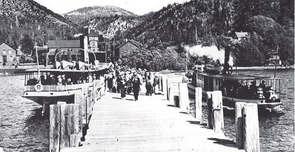 Old time photo - Tourists disembark the S.S. Tahoe and S.S. Nevada at the Glenbrook Lodge