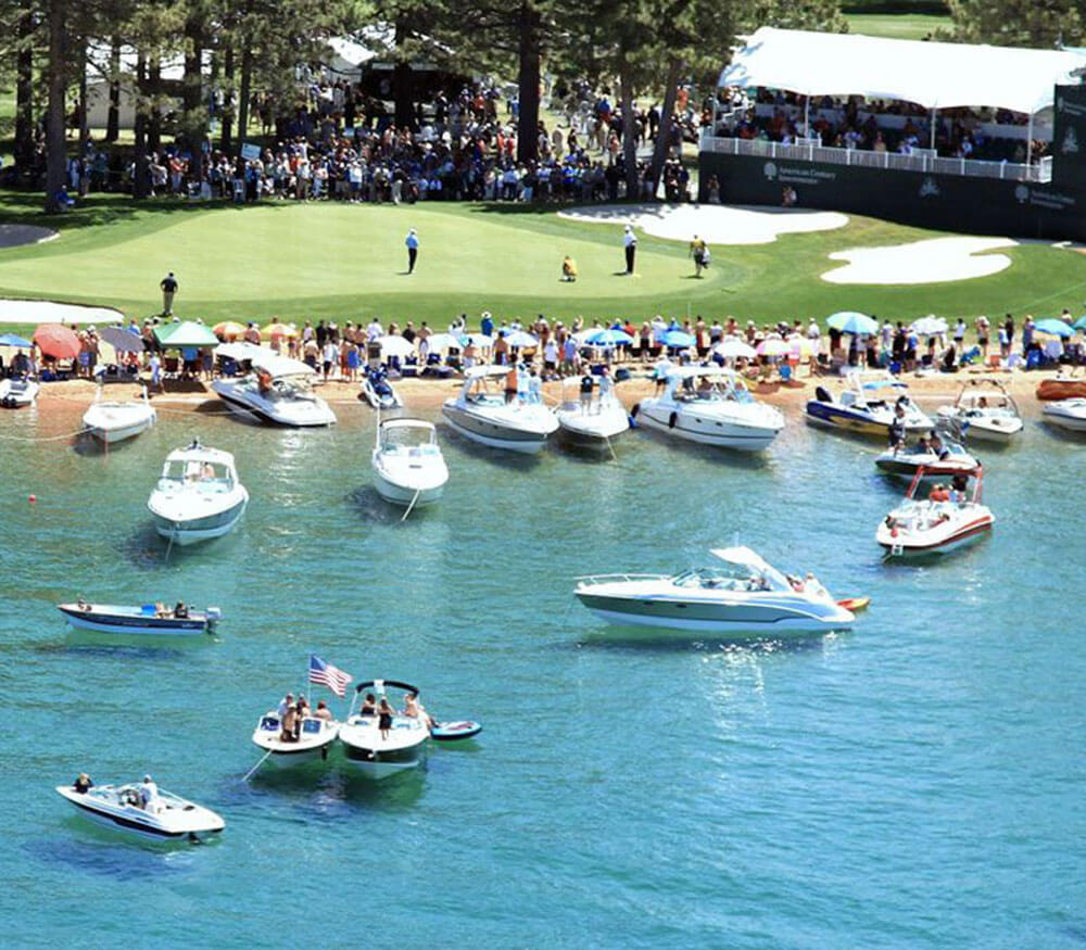 Boats on the lake at the 17th Green at Edgewood Tahoe