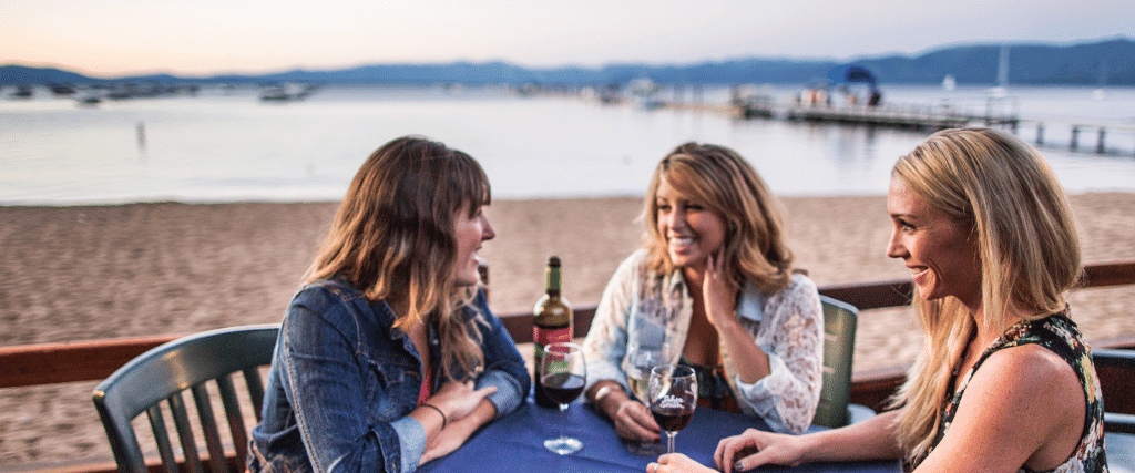 Women drinking wine in Lake Tahoe