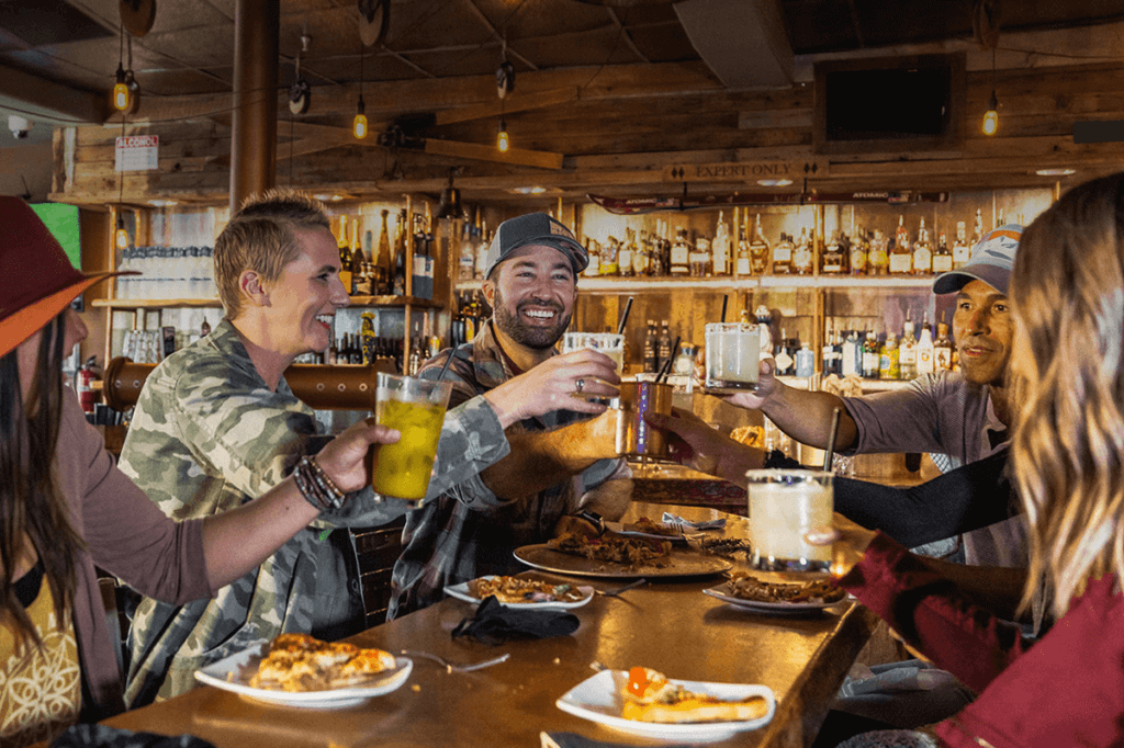 friends get dinner at lake tahoe in a bar