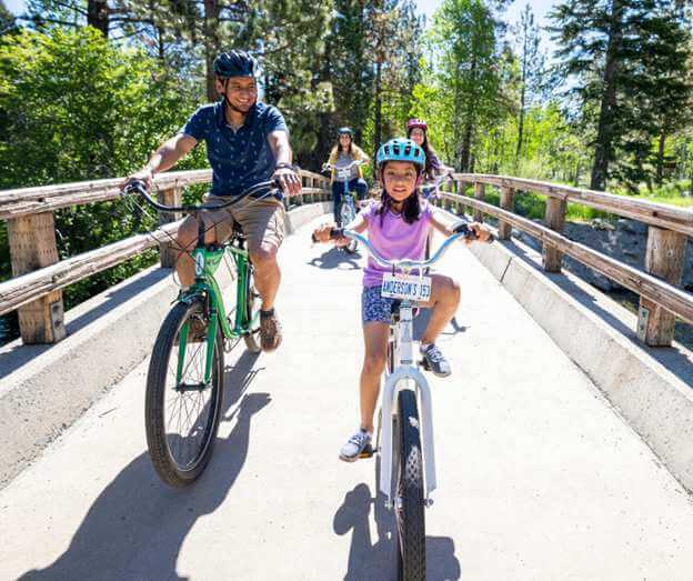 family riding bikes pope baldwin bike path