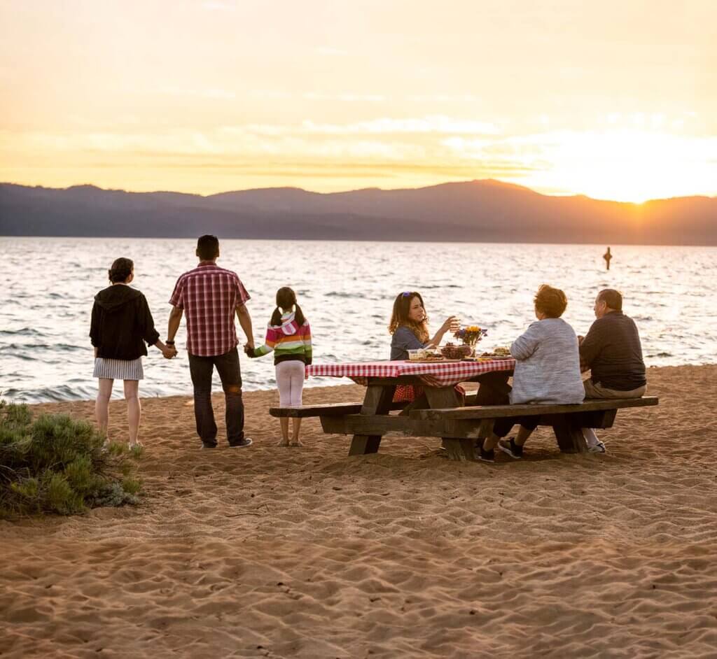 family watching lake tahoe sunset