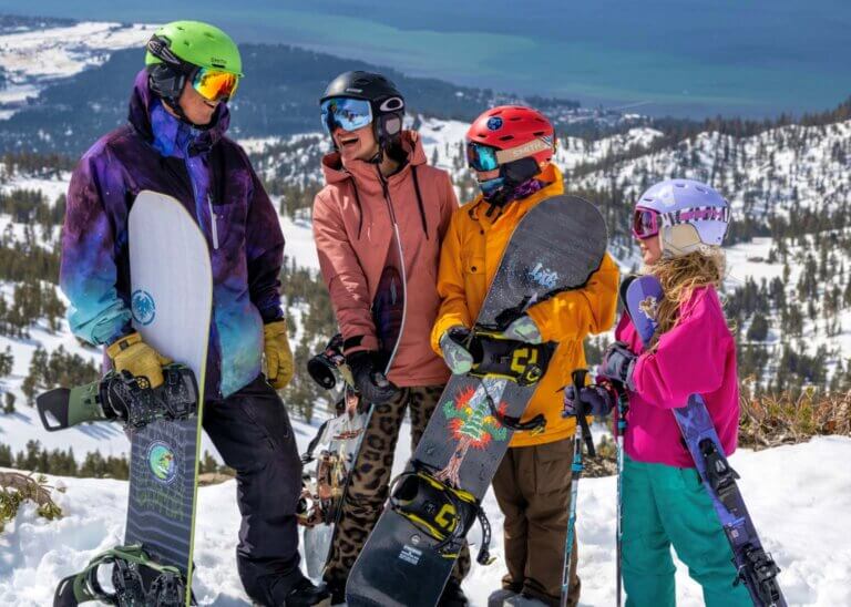 family skiing and snowboarding in lake tahoe