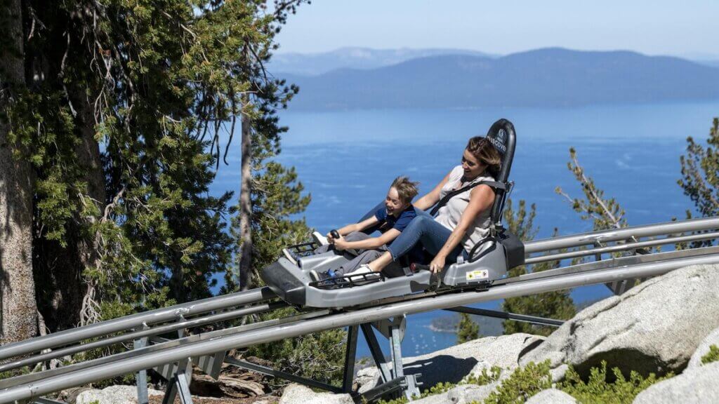 Mother and son ride Heavenly's Ridge Rider Coaster