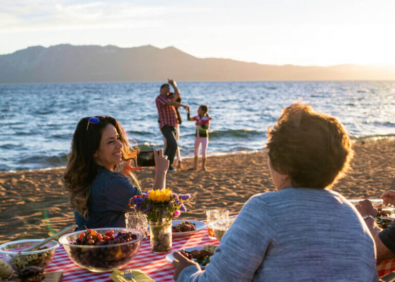 family picnic at lake tahoe beach