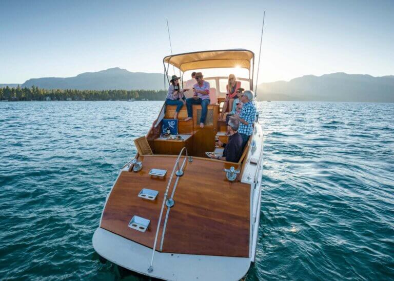 family on boat in lake tahoe