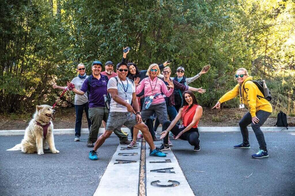 group posing at lake tahoe stateline