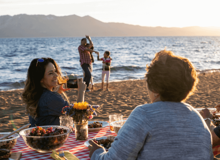 Family at the beach at sunset Lake Tahoe