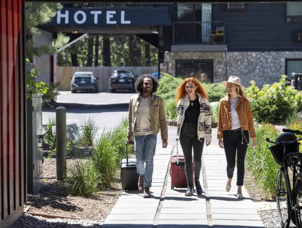 friends checking in at lake tahoe hotel