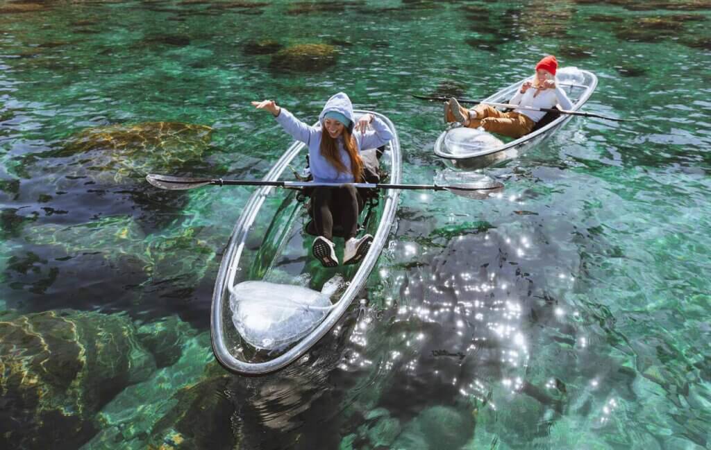 two women clear kayaks lake tahoe