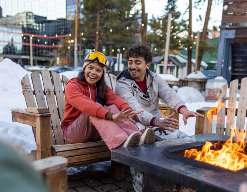 couple by firepit in south lake tahoe