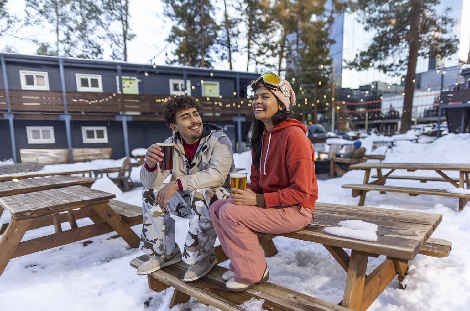 couple enjoying apres ski drinks