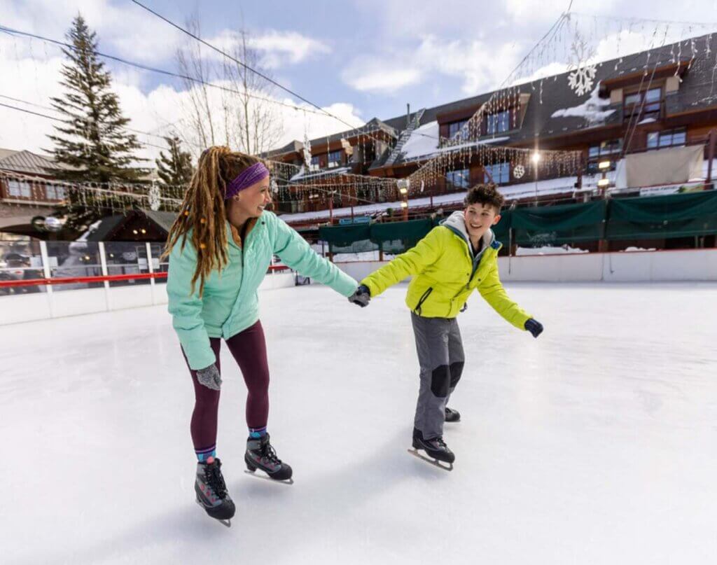 mother and son at lake tahoe ice skating rink