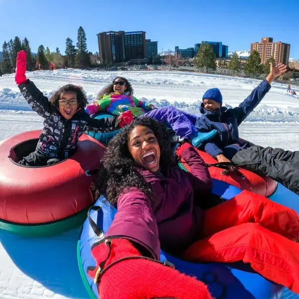 Family tubing on the snow in Lake Tahoe