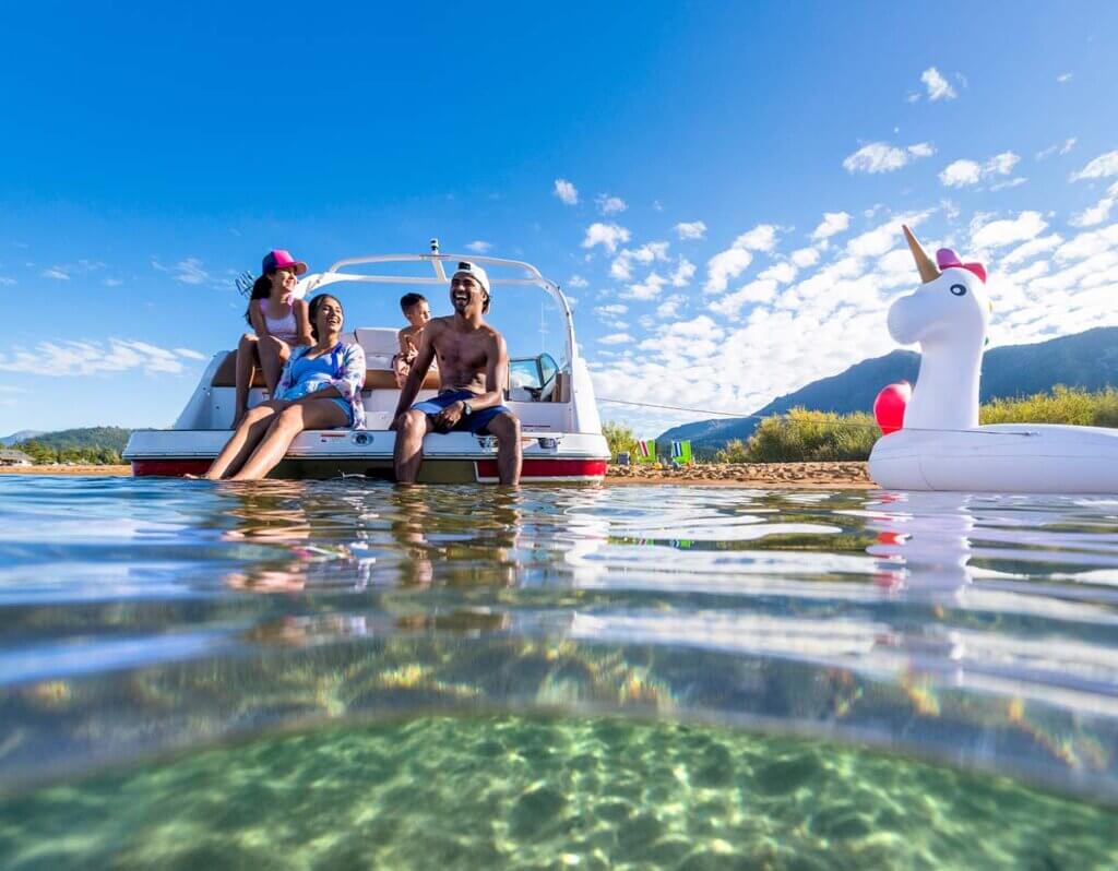 family on boat south lake tahoe