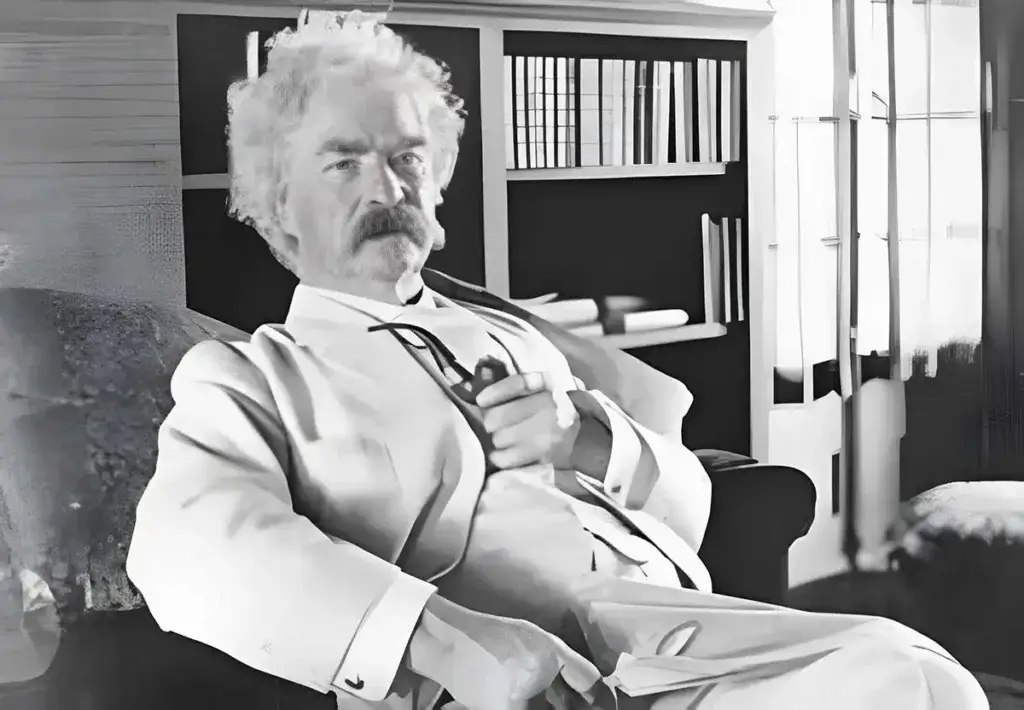The celebrated American author and humorist Mark Twain, born Samuel Langhorne Clemens, depicted in his later years wearing his iconic white linen suit. 
