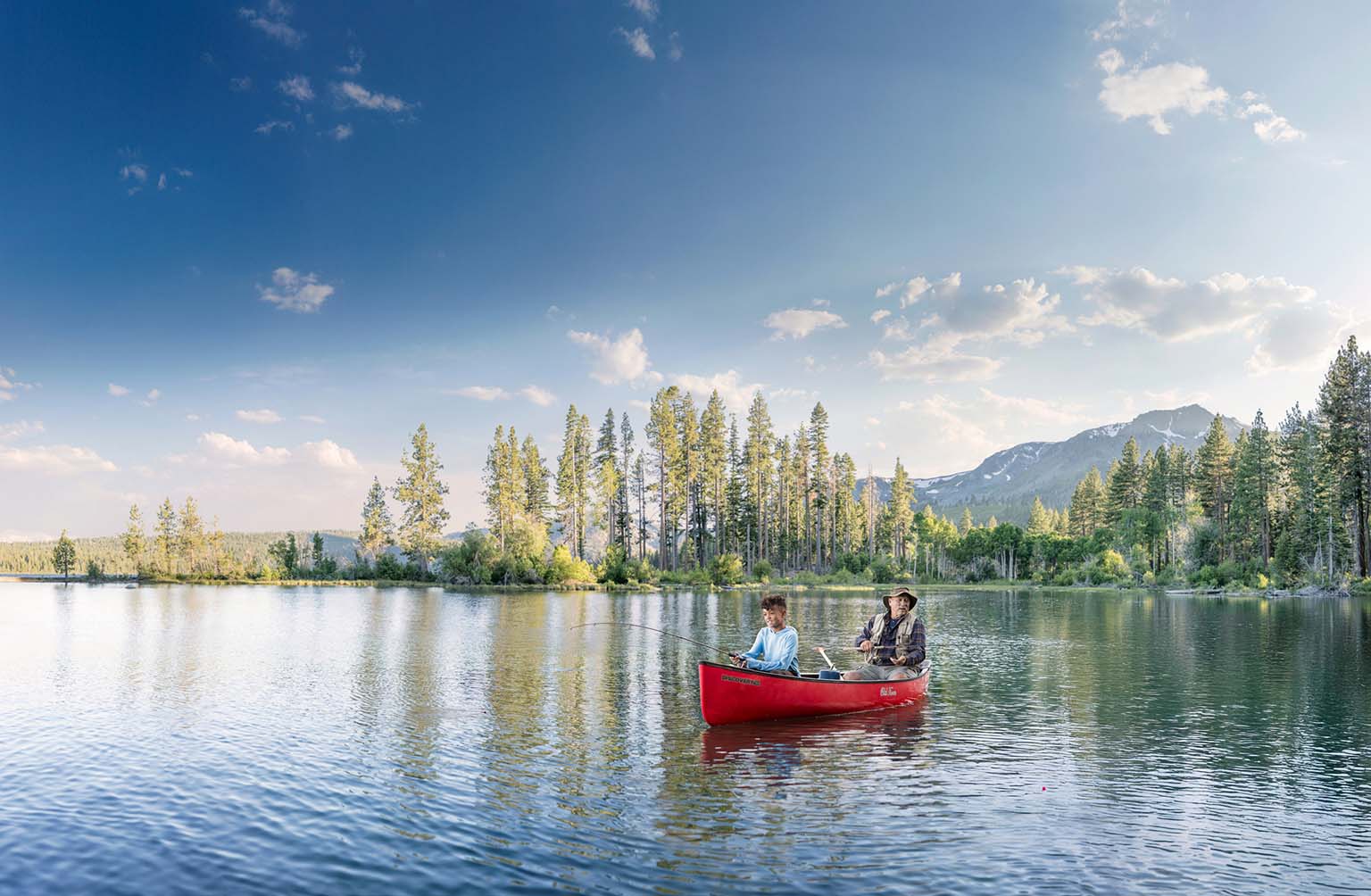 grandfather and kid fishing at south lake tahoe