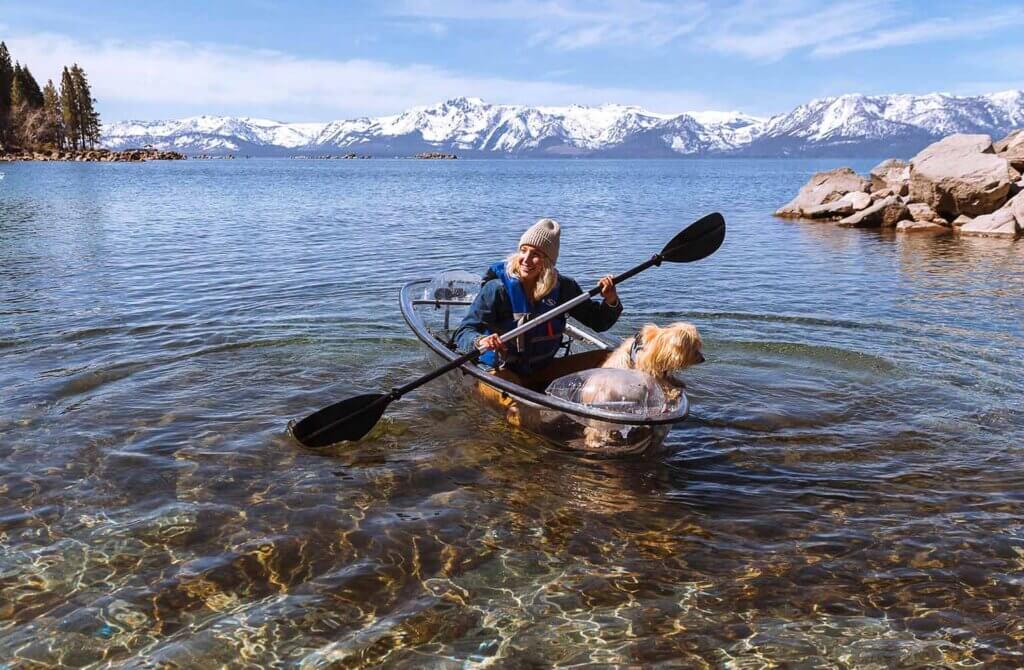 woman and dog kayaking south lake tahoe